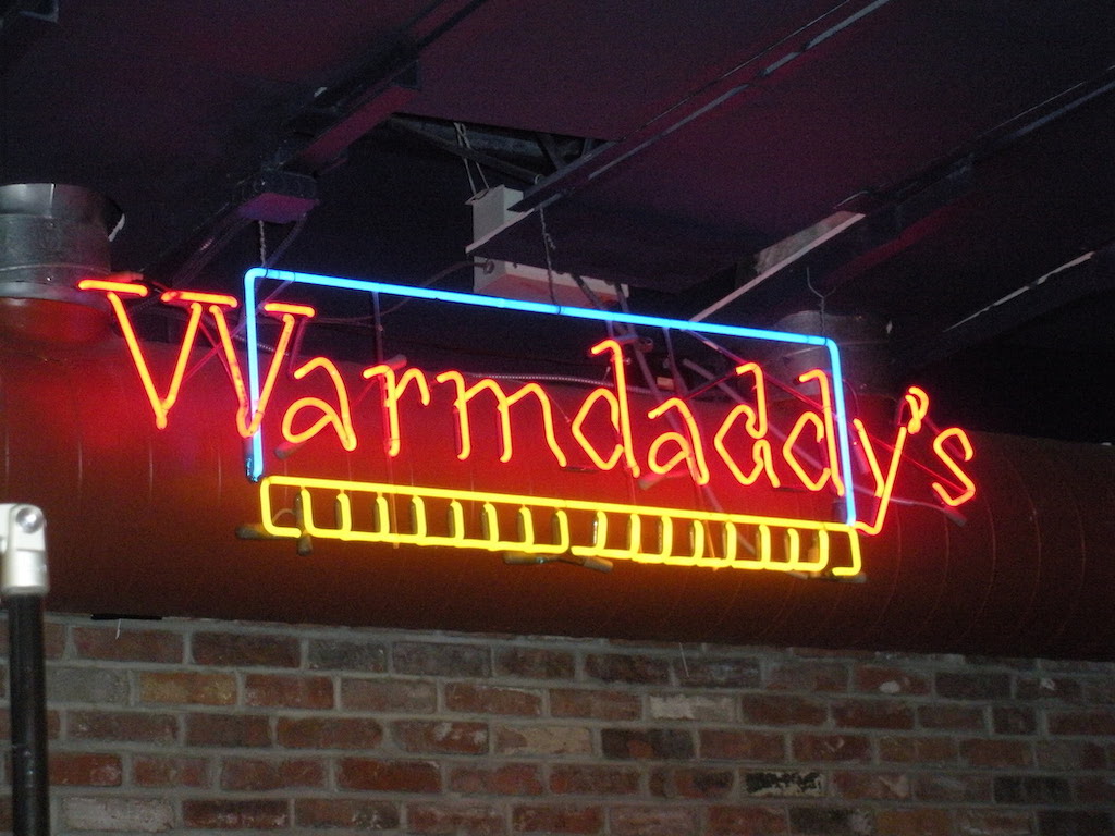 warm daddys neon sign interior