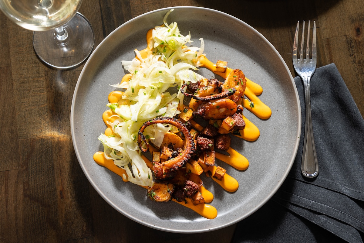Fond Launches a Monthly Wine Pairing Dinner Series with Oregon Pinots on May 19 3 Plated octopus dish at Fond paired with white wine, photographed overhead