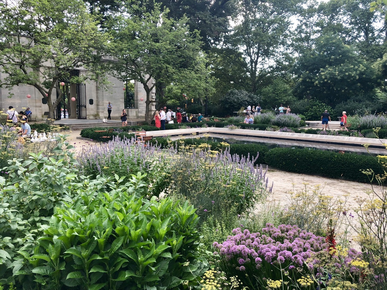 The Rodin Museum Garden Bar Returns May 29 With a New Food Truck and a Crossing Choir Performance 2 The Rodin Museum garden with its reflecting pool, lavender plantings, and paper lanterns during a summer Garden Bar evening on the Benjamin Franklin Parkway.